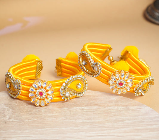 Handcrafted Yellow Silk Thread Bangles with Kundan and Paisley Motifs