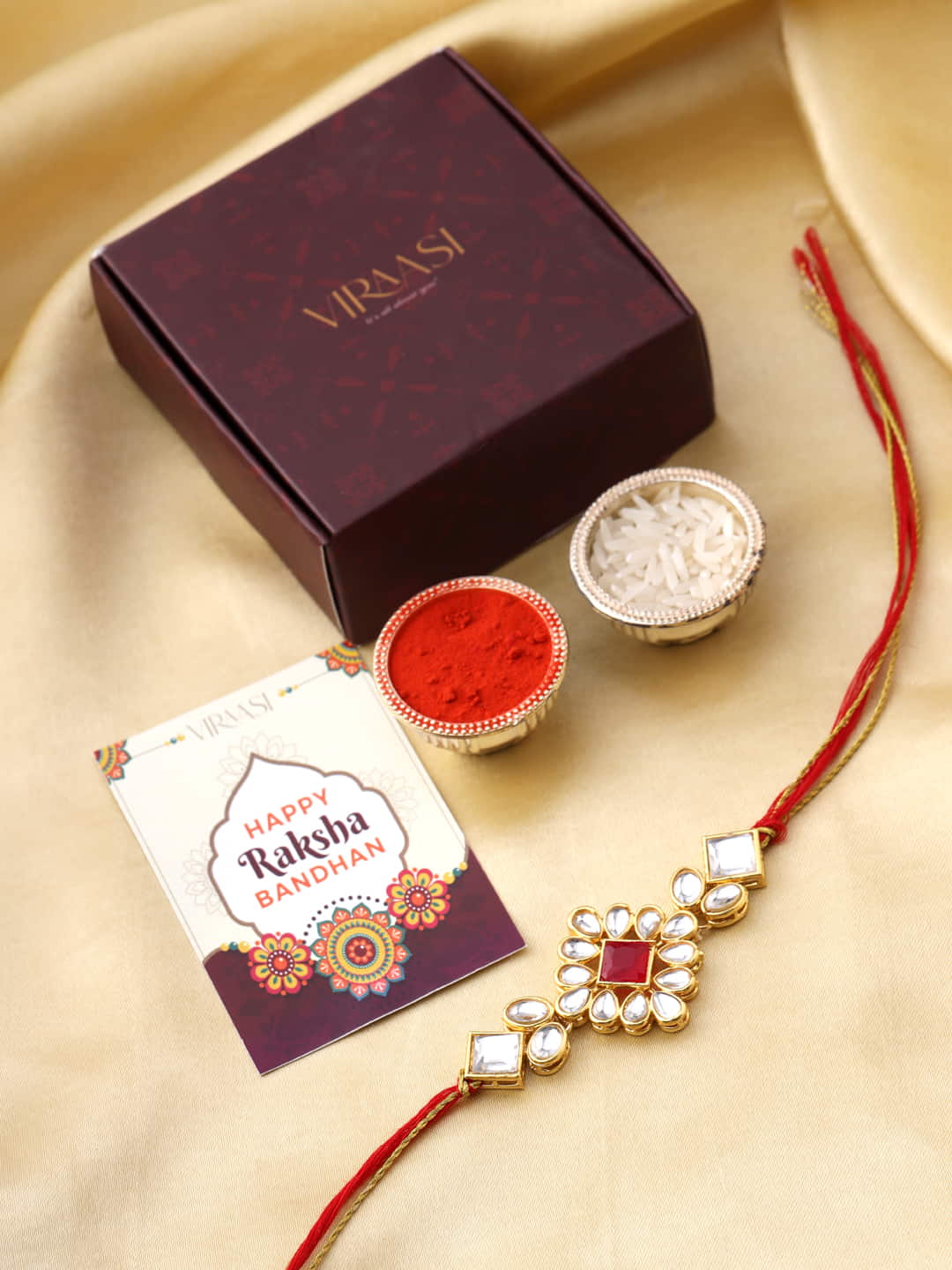 Red and Gold Toned Kundan Rakhi for Brother